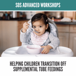 Toddler sitting in a highchair, eating with a spoon, wearing a bib, in a kitchen setting.